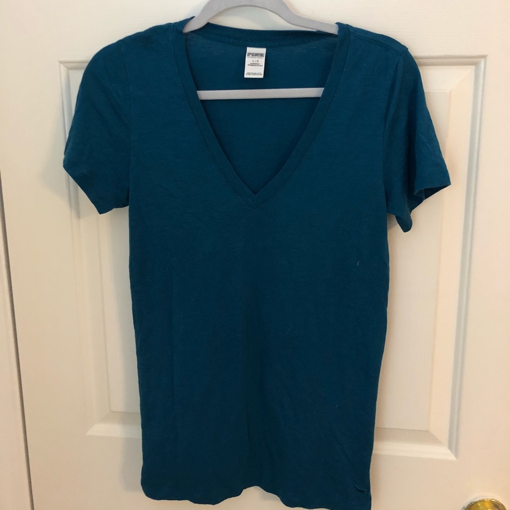 Pink V-neck shirt